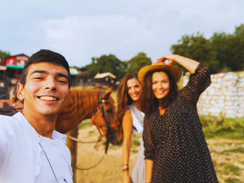 friends happy with horse